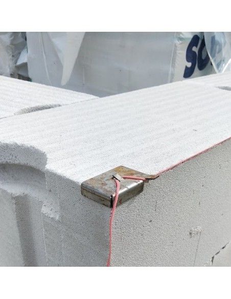 Buckle for fastening the cords to the wall